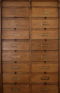 image of a vintage wooden multi-layer file cabinet