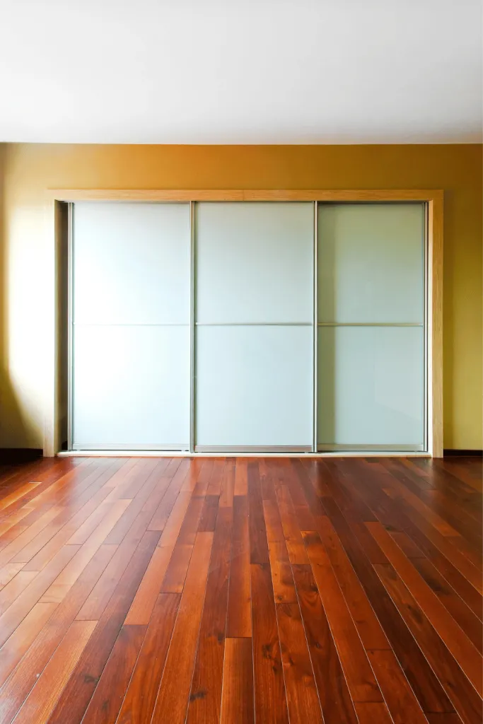 new sliding closet door in empty room