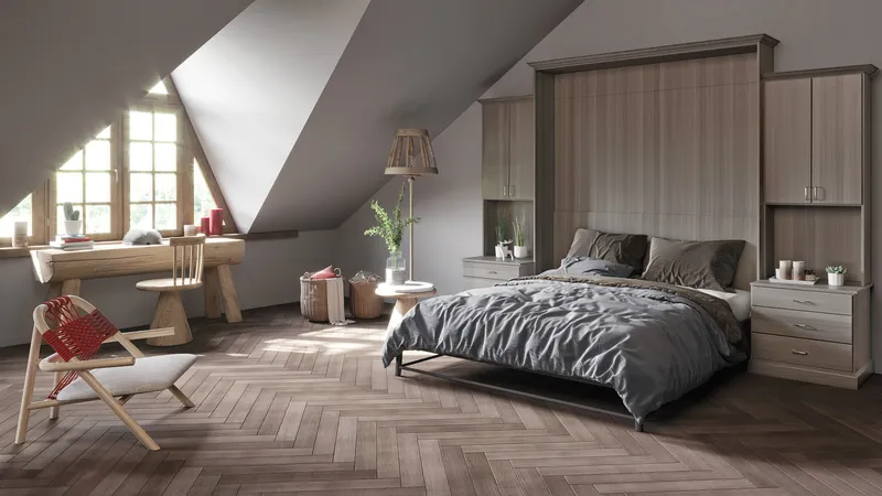 Contemporary Murphy bed extended in an attic bedroom with built-in storage, wood flooring, and natural light from a dormer window.