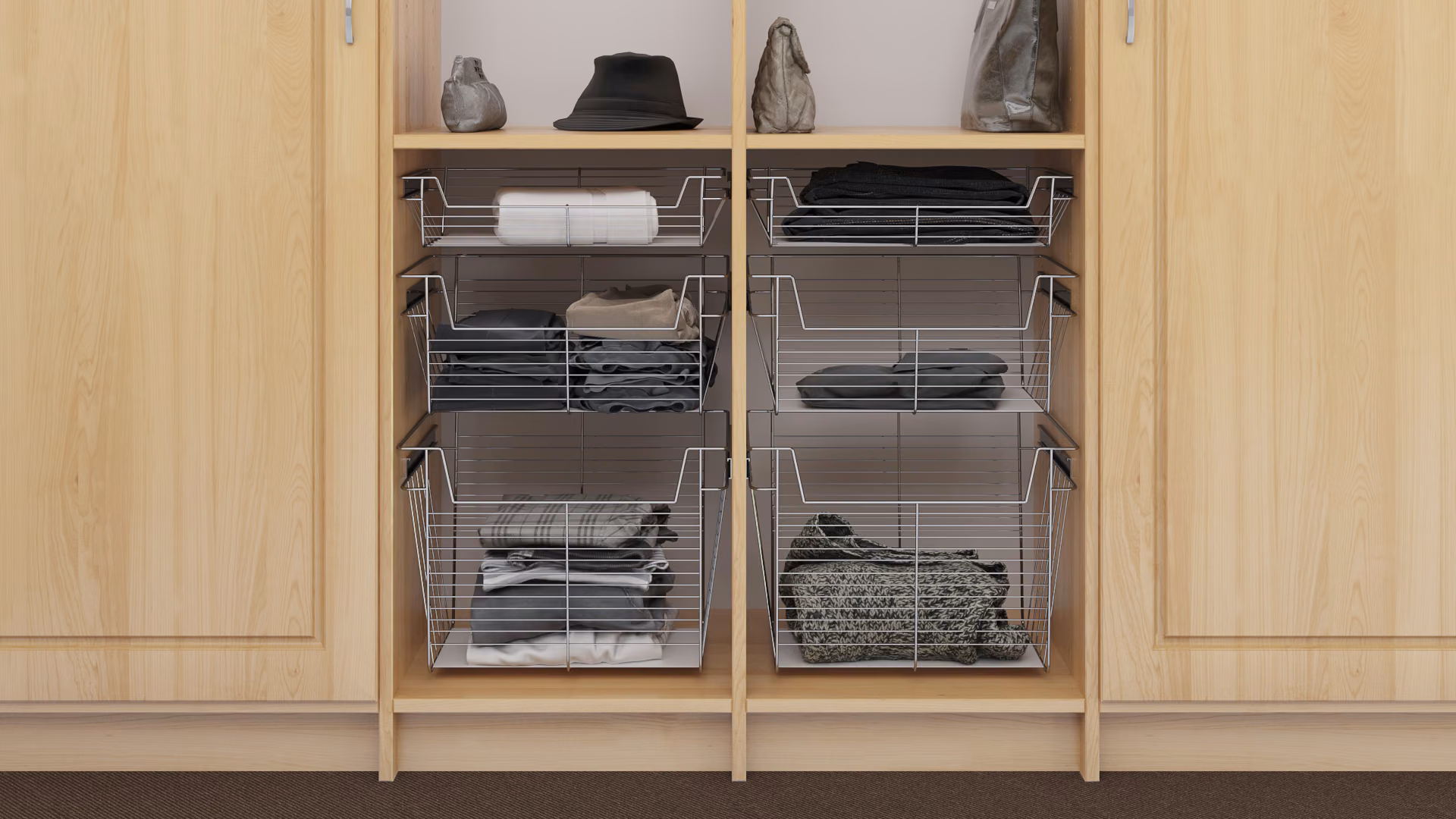 Closet section with stacked wire baskets holding folded clothes and accessories.