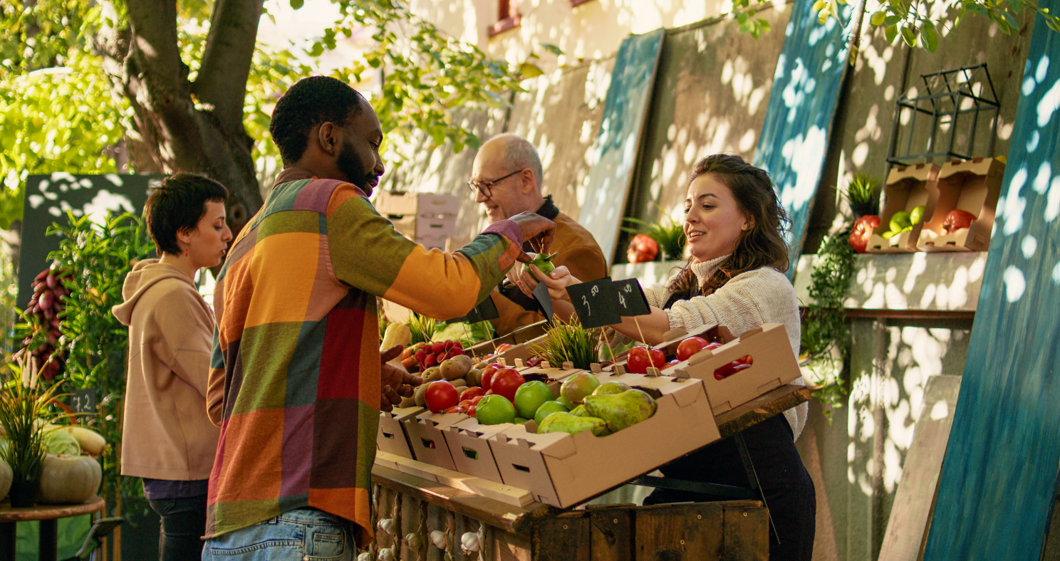 Person holding pumpkin