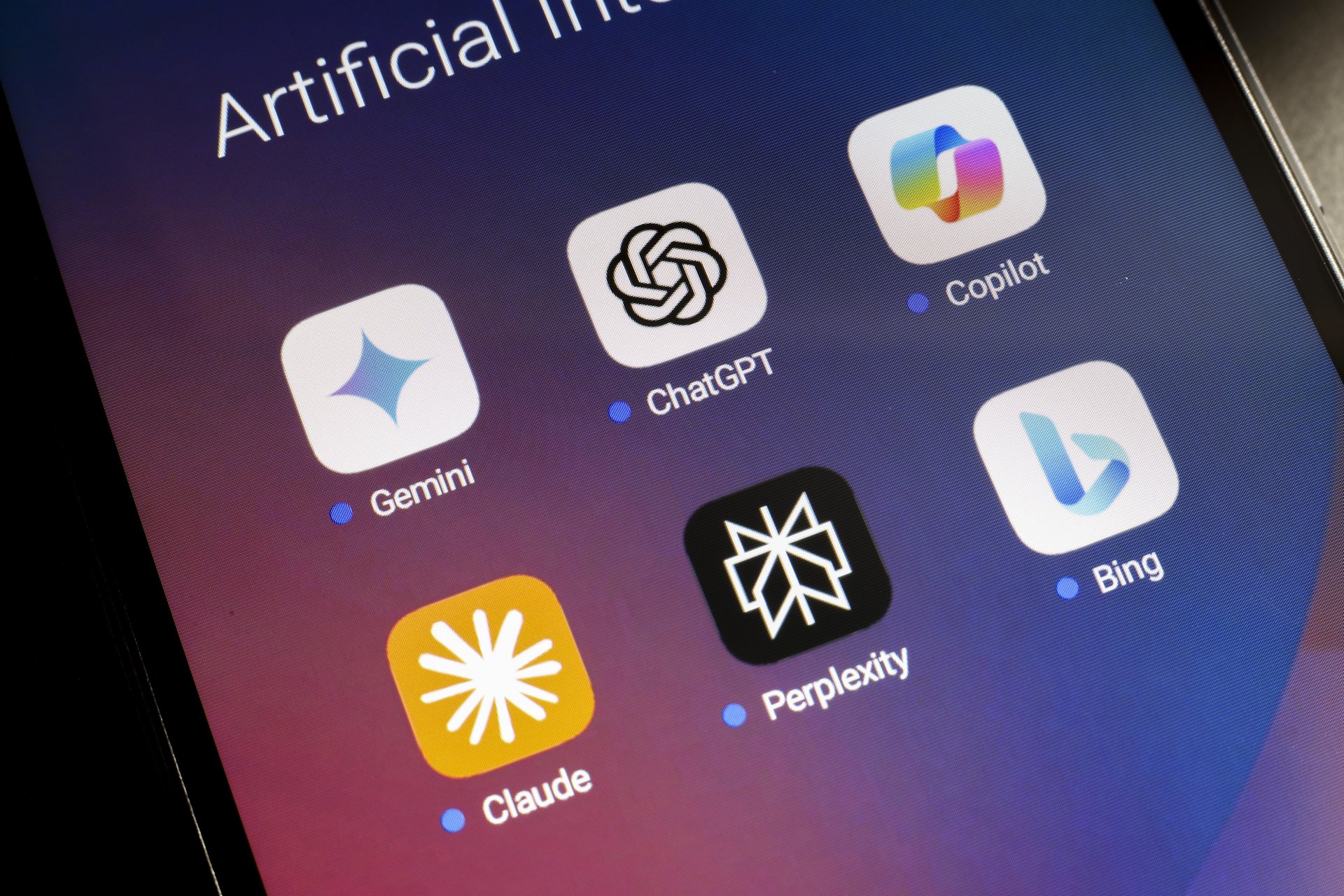 AI chatbot apps on a mobile screen, including Claude, ChatGPT, Gemini, Copilot, Bing, and Perplexity
