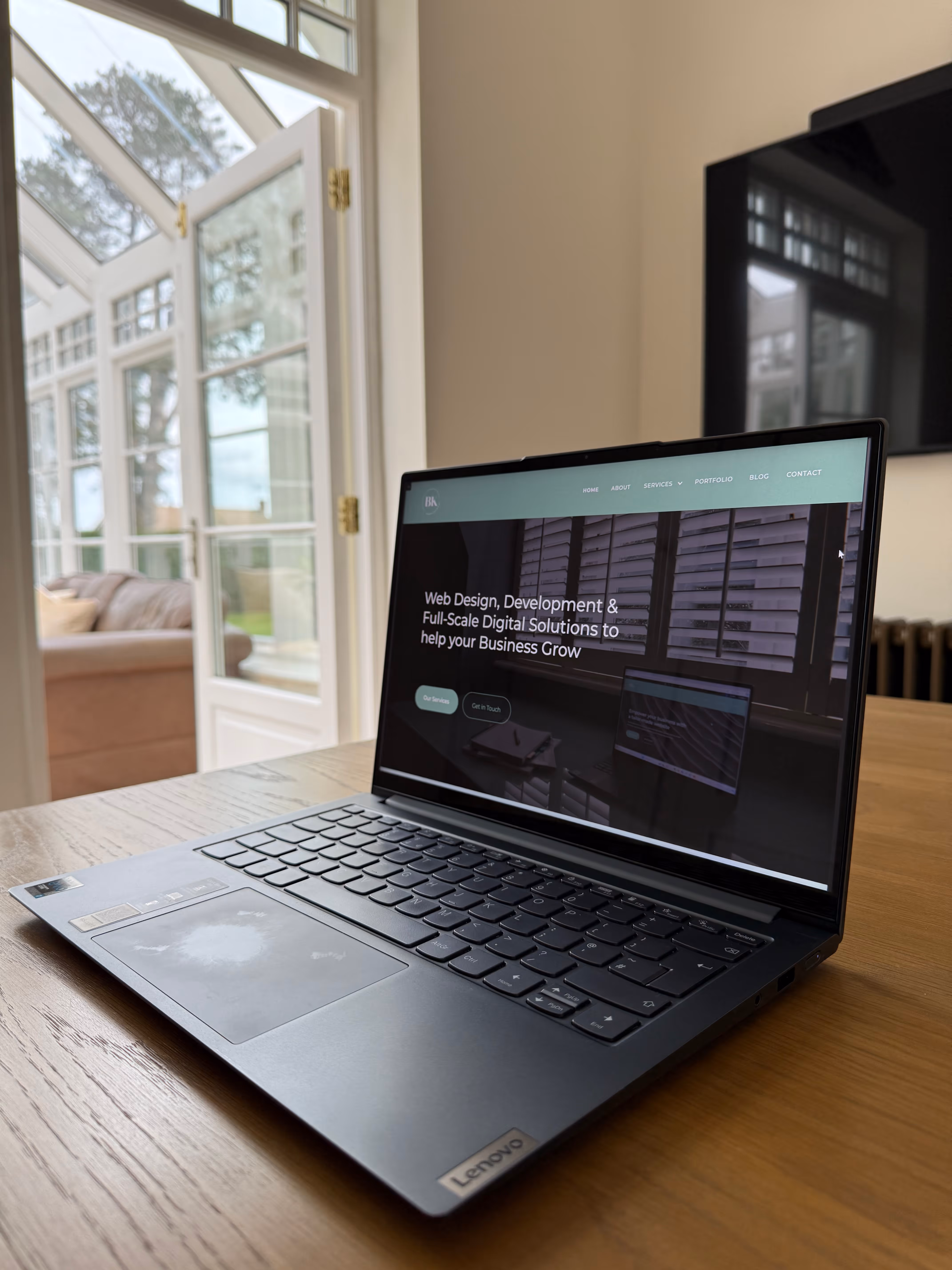 BK Development website on a laptop