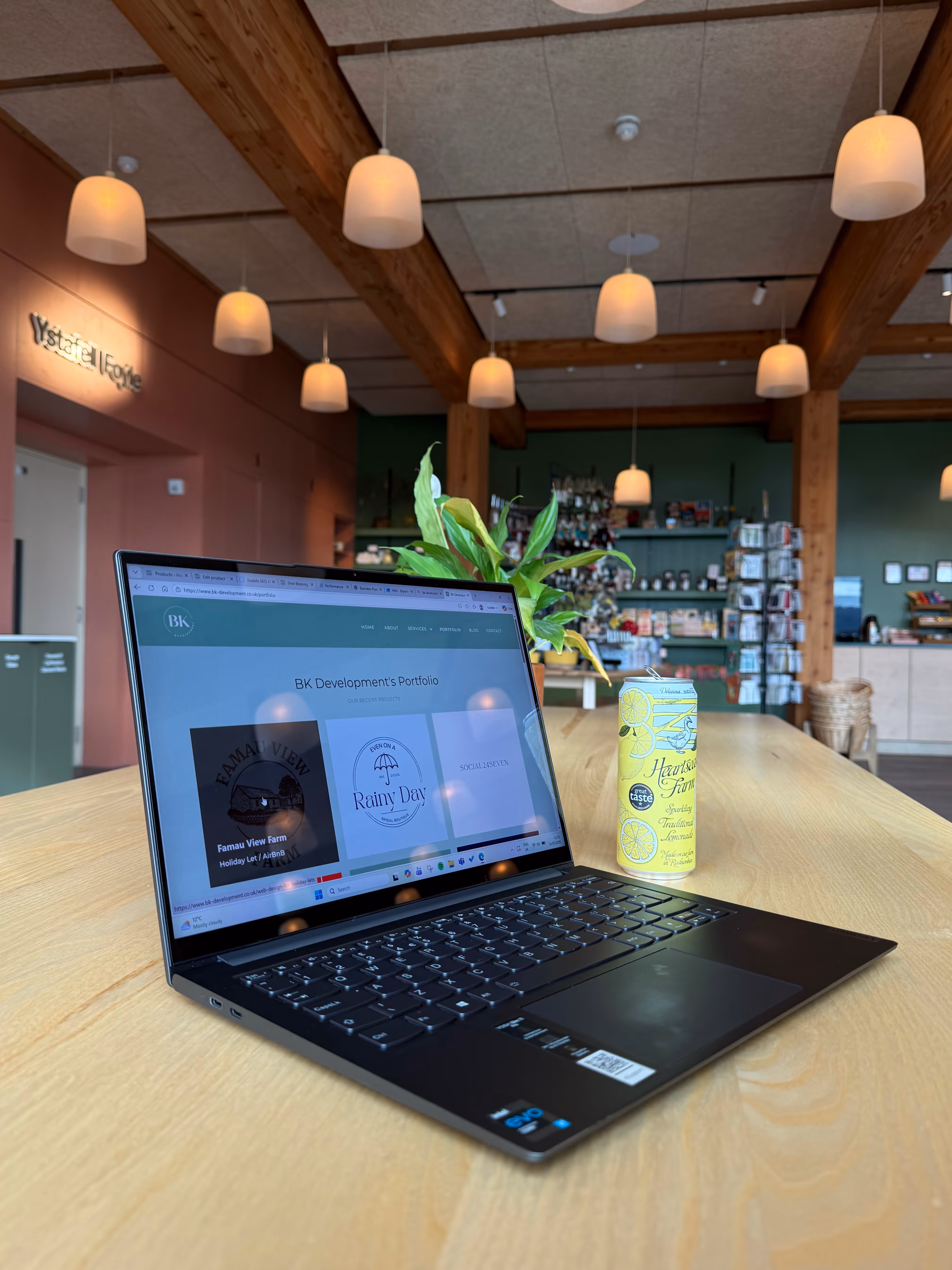 A laptop showing BK Development's portfolio