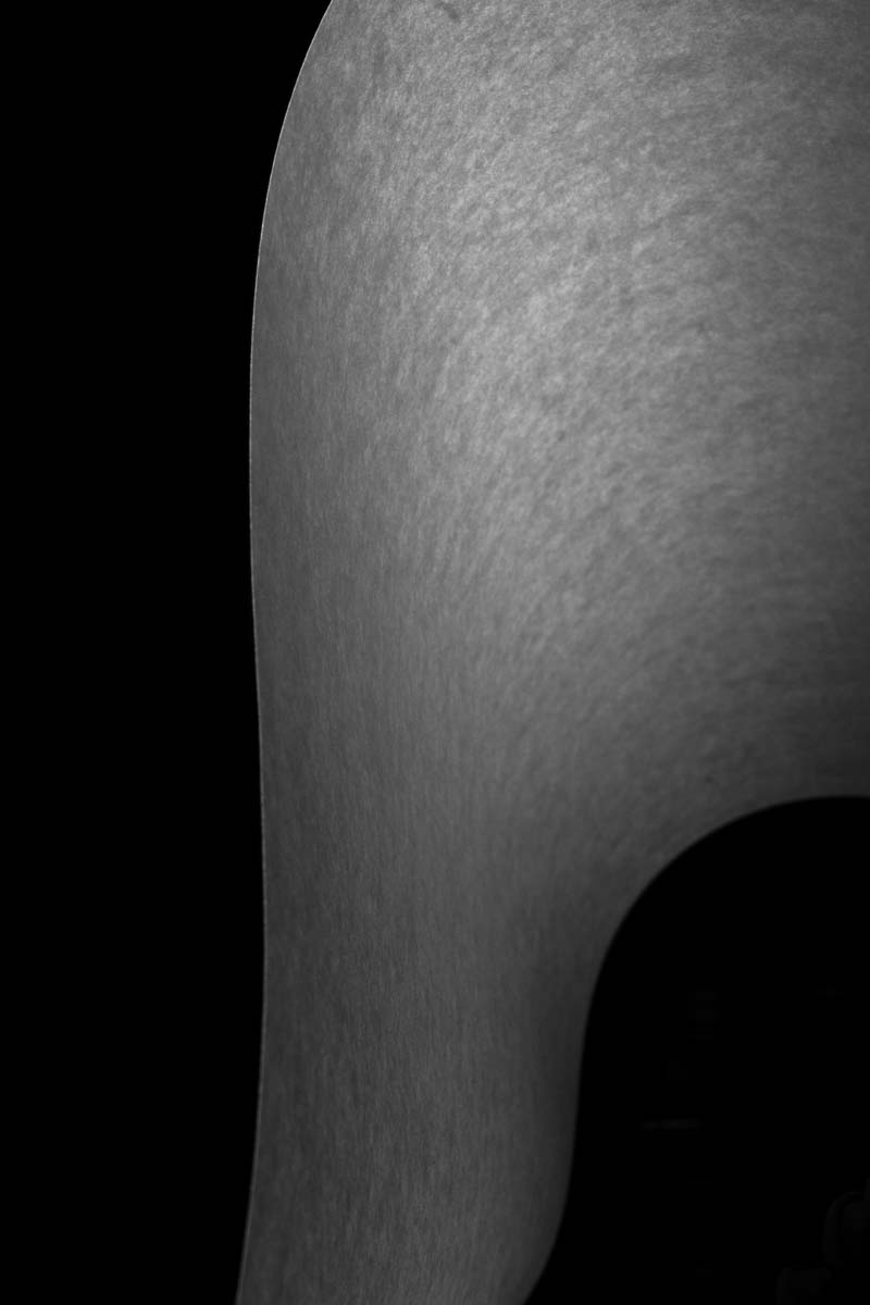 Abstract image of a form with light shining through.
