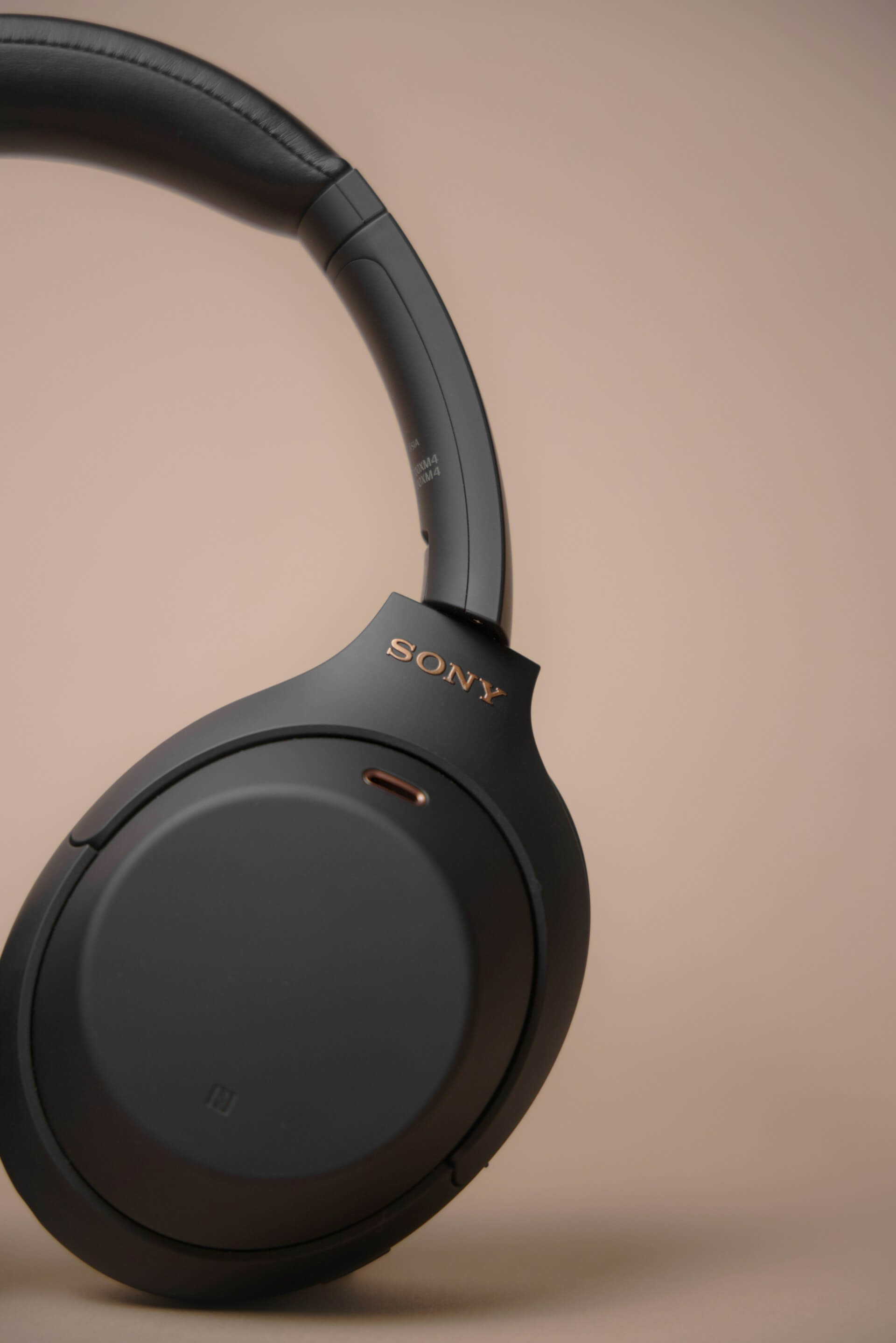 Background image of a pair of SONY headphones