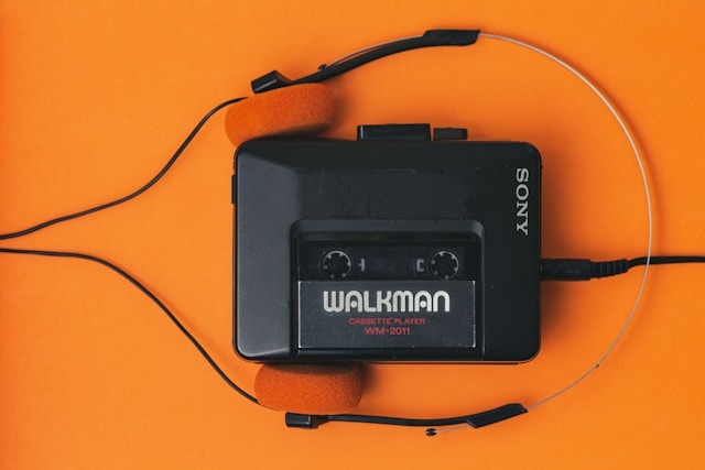 A cassette player with headphones, the grandfather of the IPod.