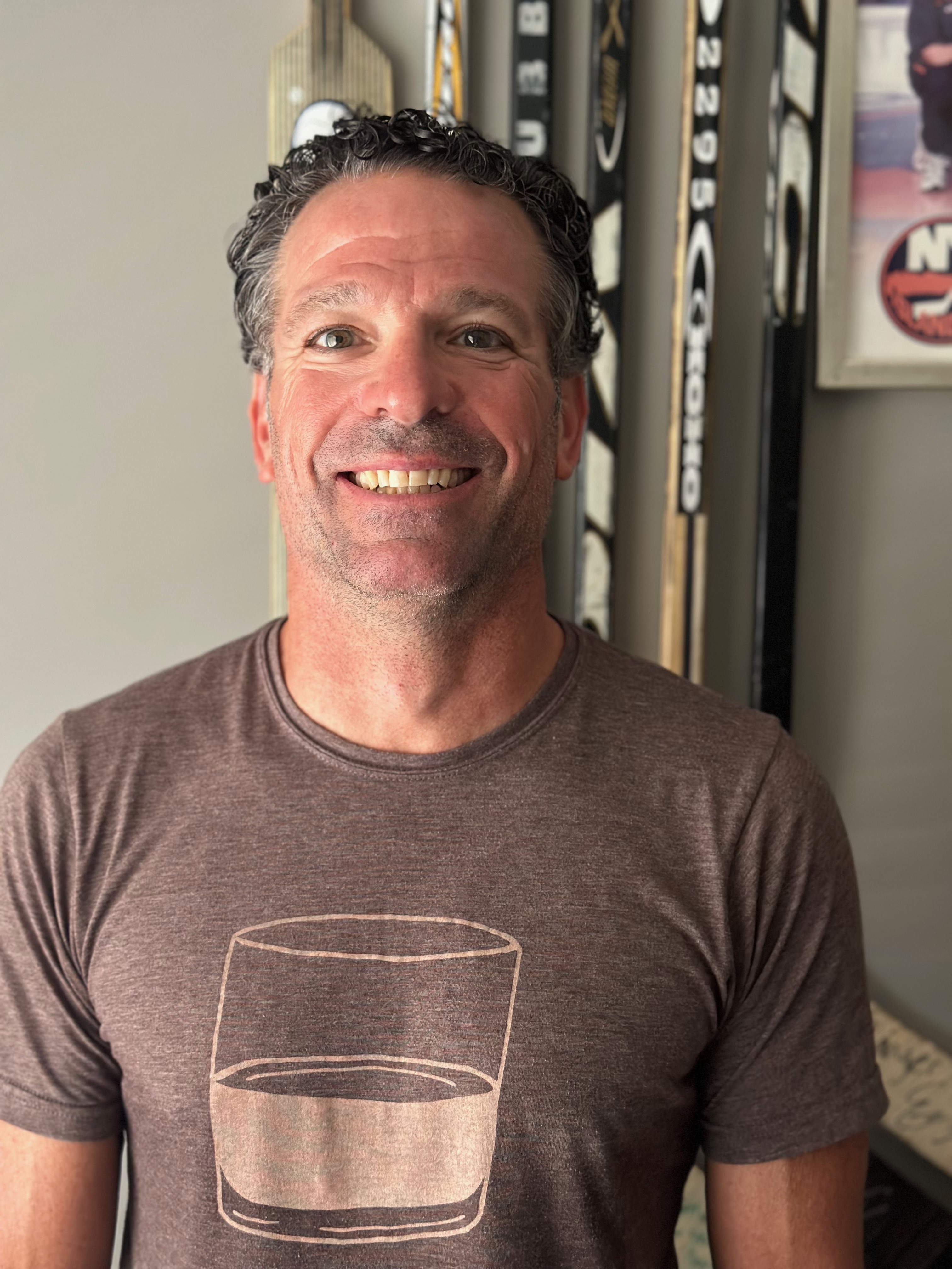 “Photo of functional sports therapist Dave Claing with podcast hosts Amanda and Carolina discussing performance bodywork, recovery, and injury prevention on Büddhi Babble.”