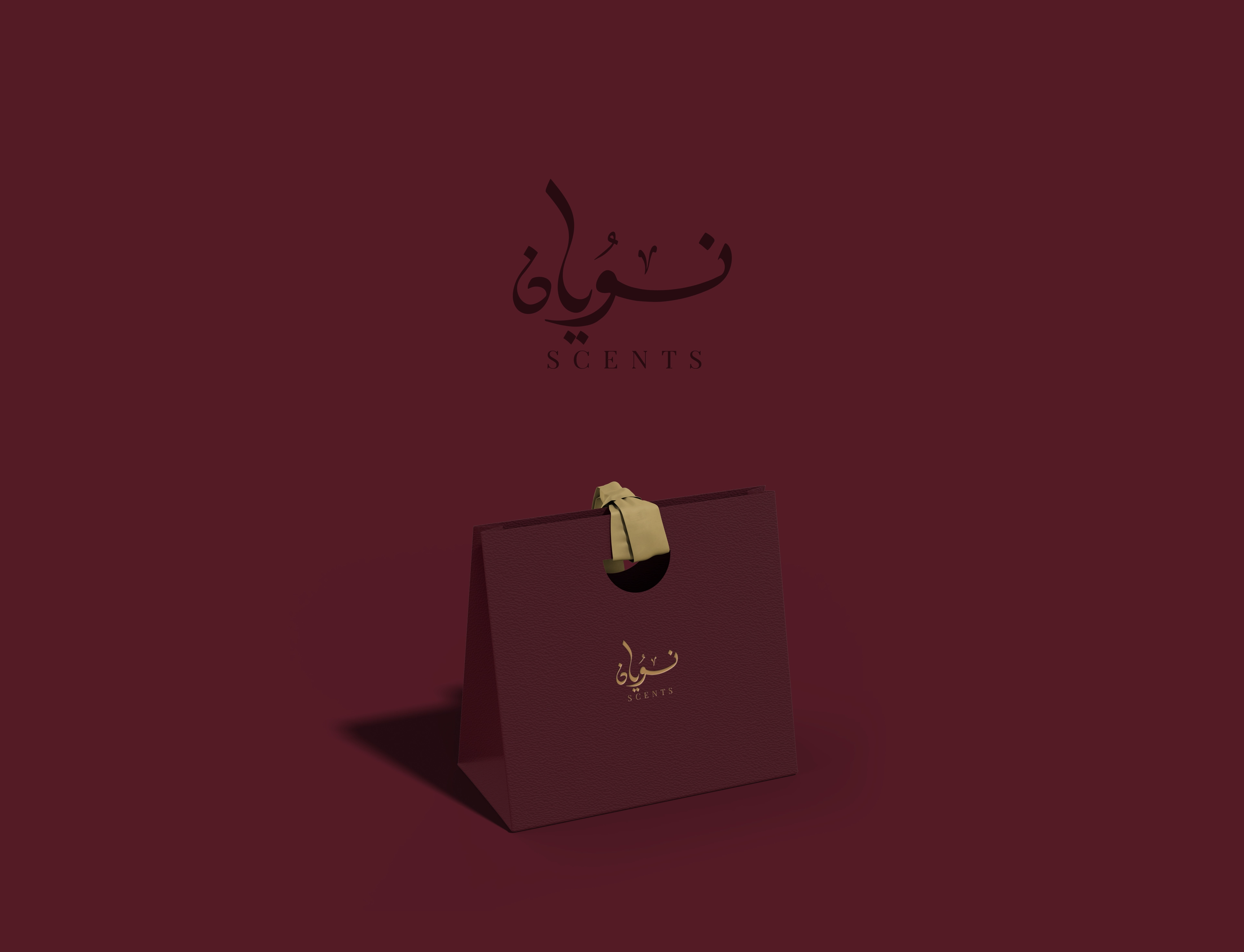 Elegant dark maroon shopping bag with a beige ribbon handle and Arabic calligraphy above the word SCENTS.