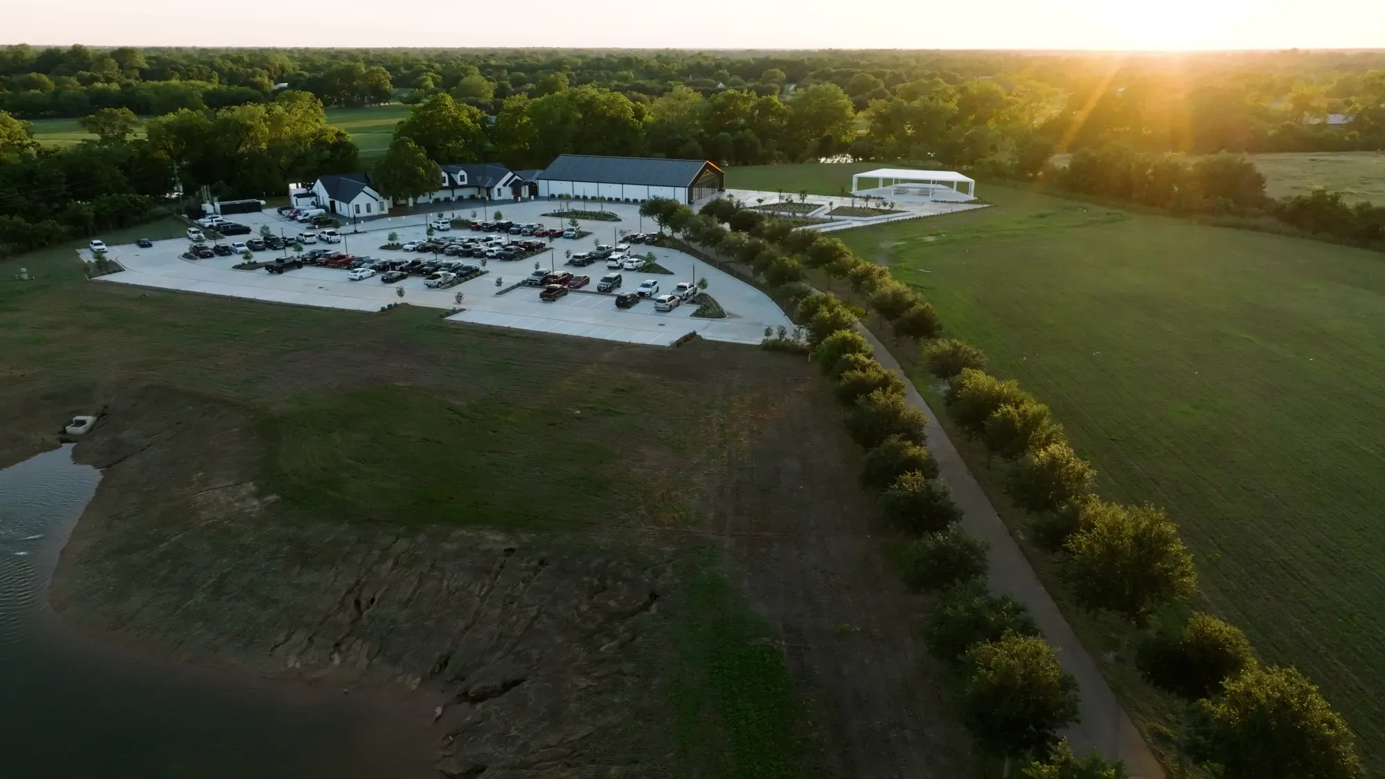 Aerial view of the White Oaks estate and grounds at sunset