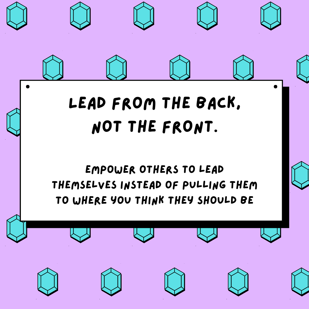 A sign that says "Lead from the back, not the front.".