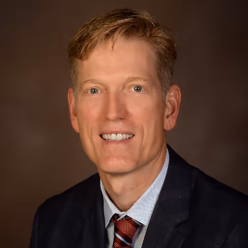 A headshot of Mike Smith, a partner of GHC Industries.