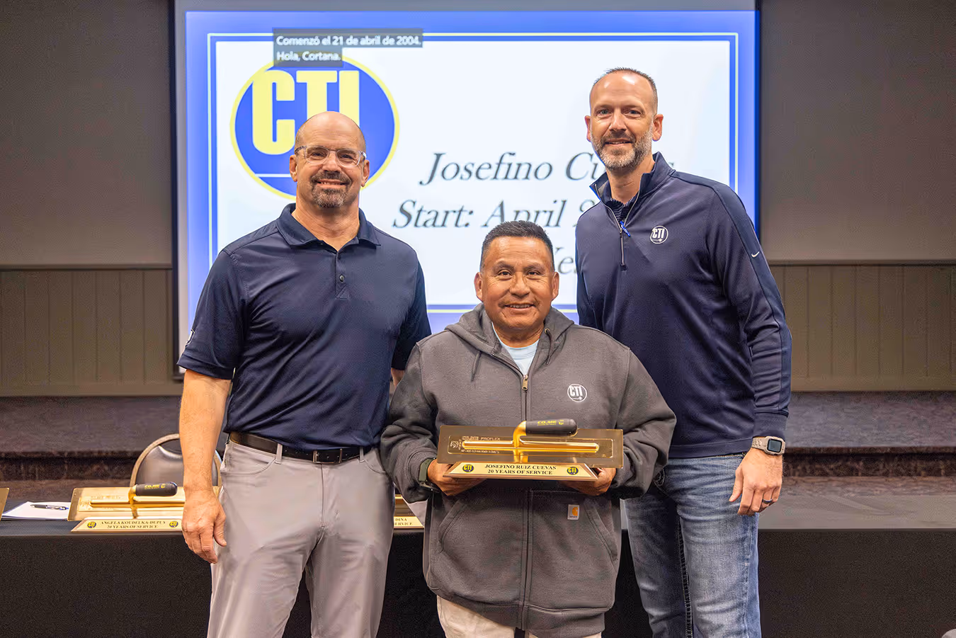 Awarding employee with 20 years of service working for CTI concrete in Iowa