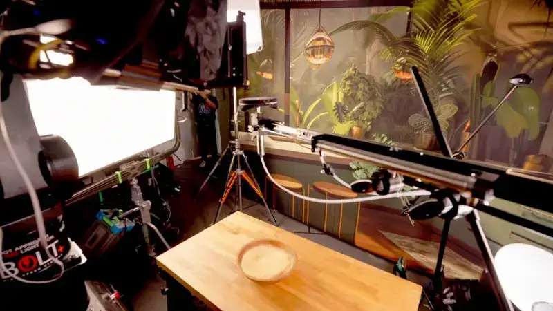 BTS of Mocolab's team creating a in-camera effect of two shrimp dropping perfectly timed to be in frame.