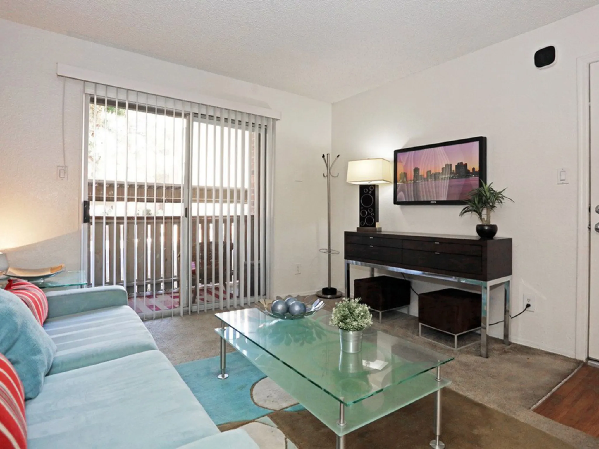 Furnished apartment living area shown — representative home at Morgan Park.