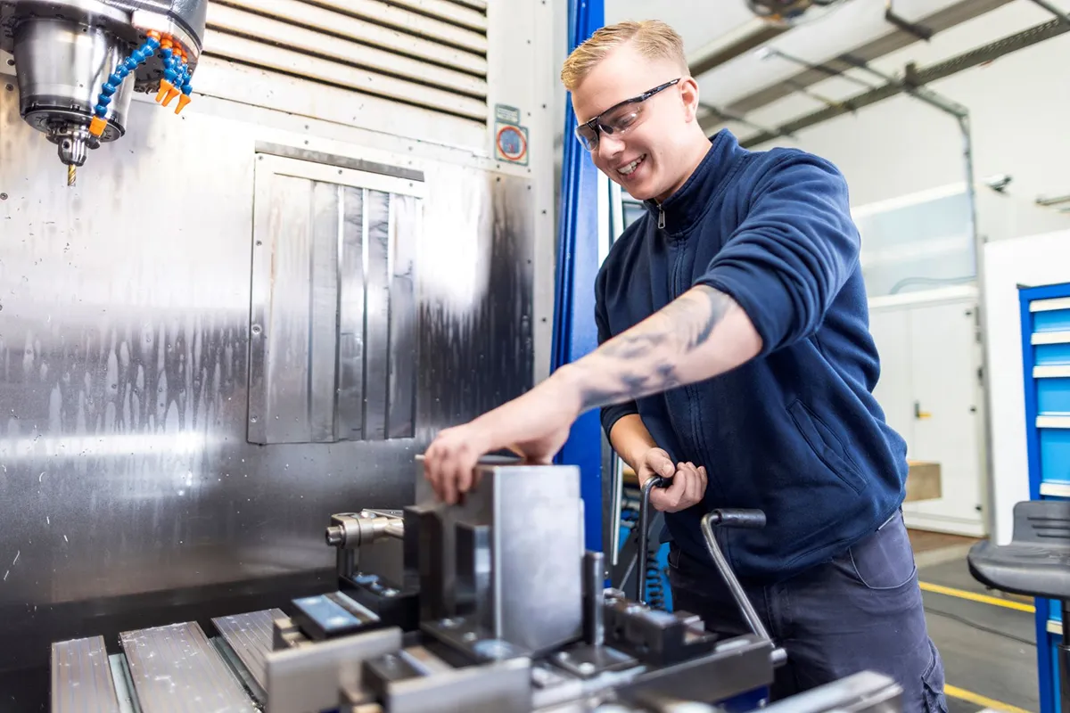 BAADER Machinist operating CNC equipment