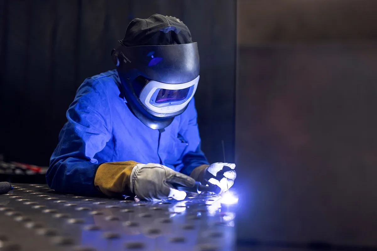 BAADER Welder working with bright arc light