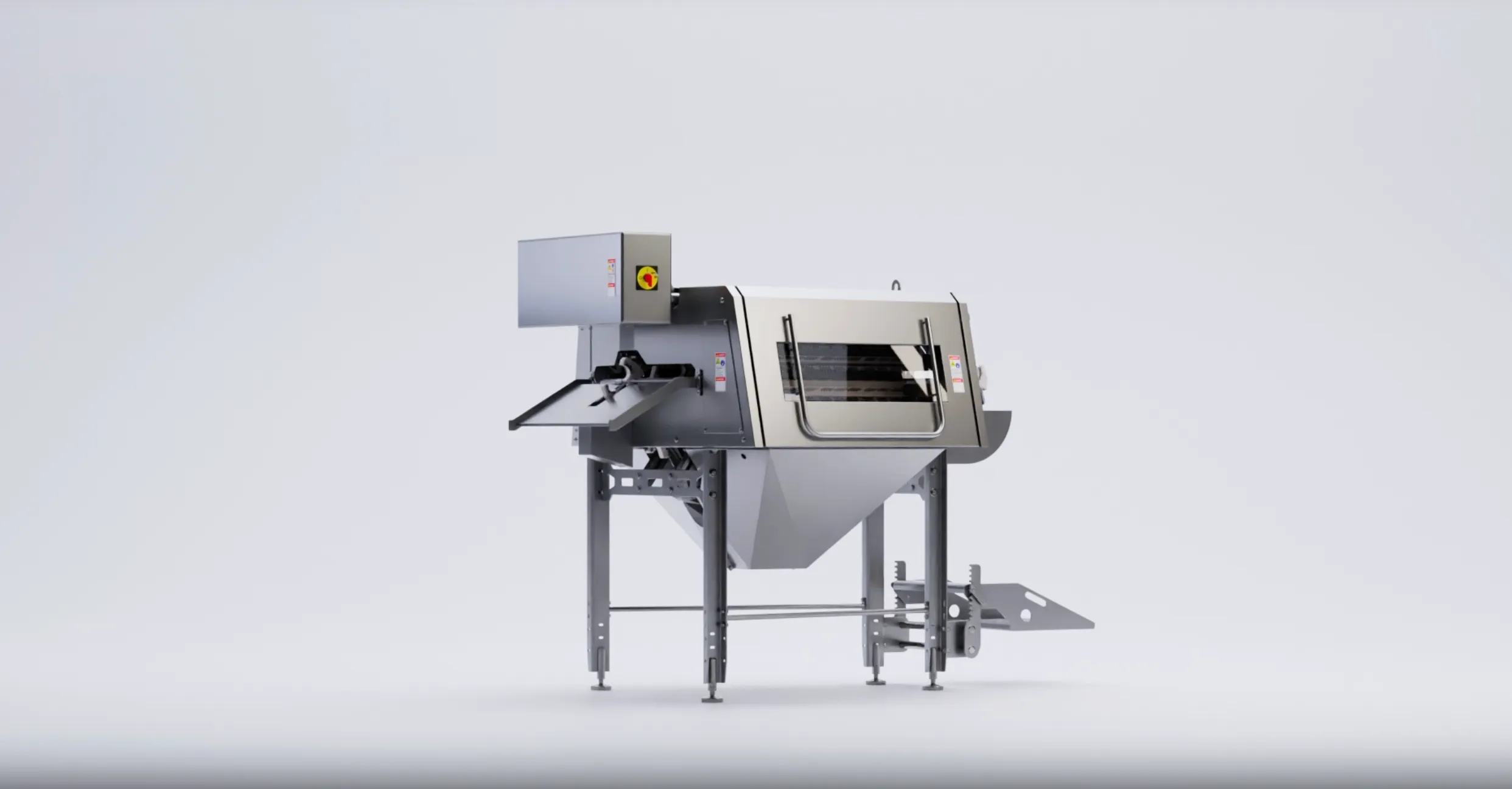Industrial stainless steel machine with a control box and feeder chute on a plain white background.