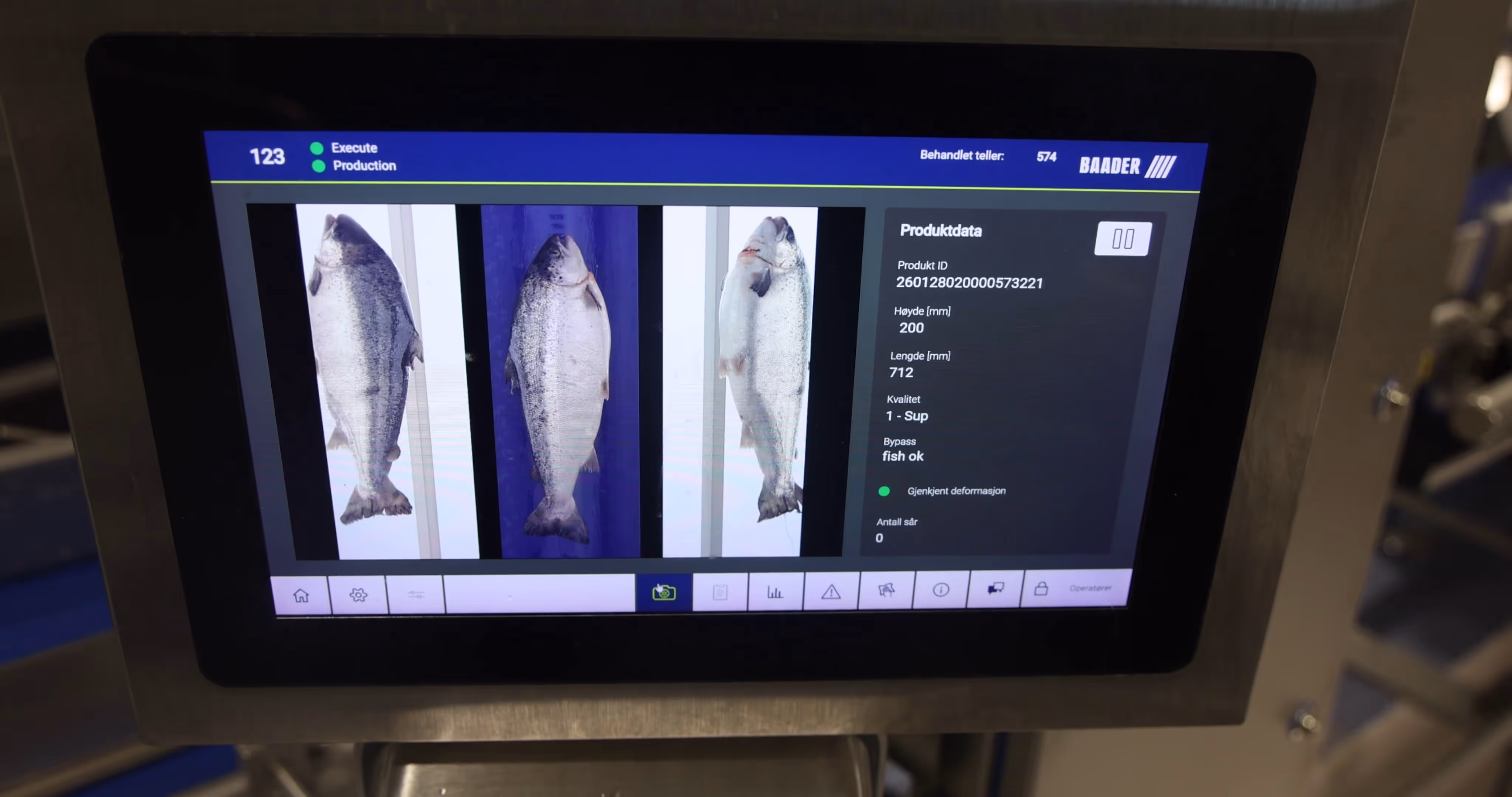 Industrial screen showing images of three fish with product data including height, length, quality, and bypass status.