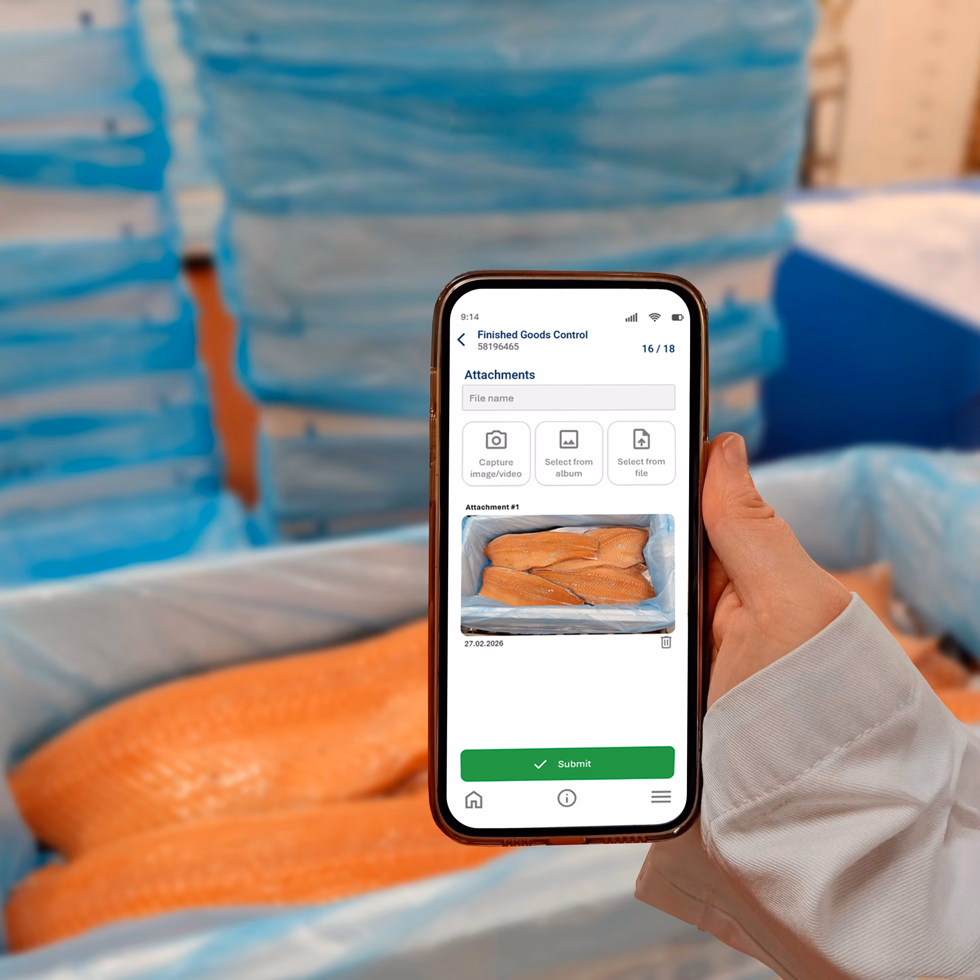 Hand holding phone displaying a finished goods control app with salmon fillet attachments for submission.