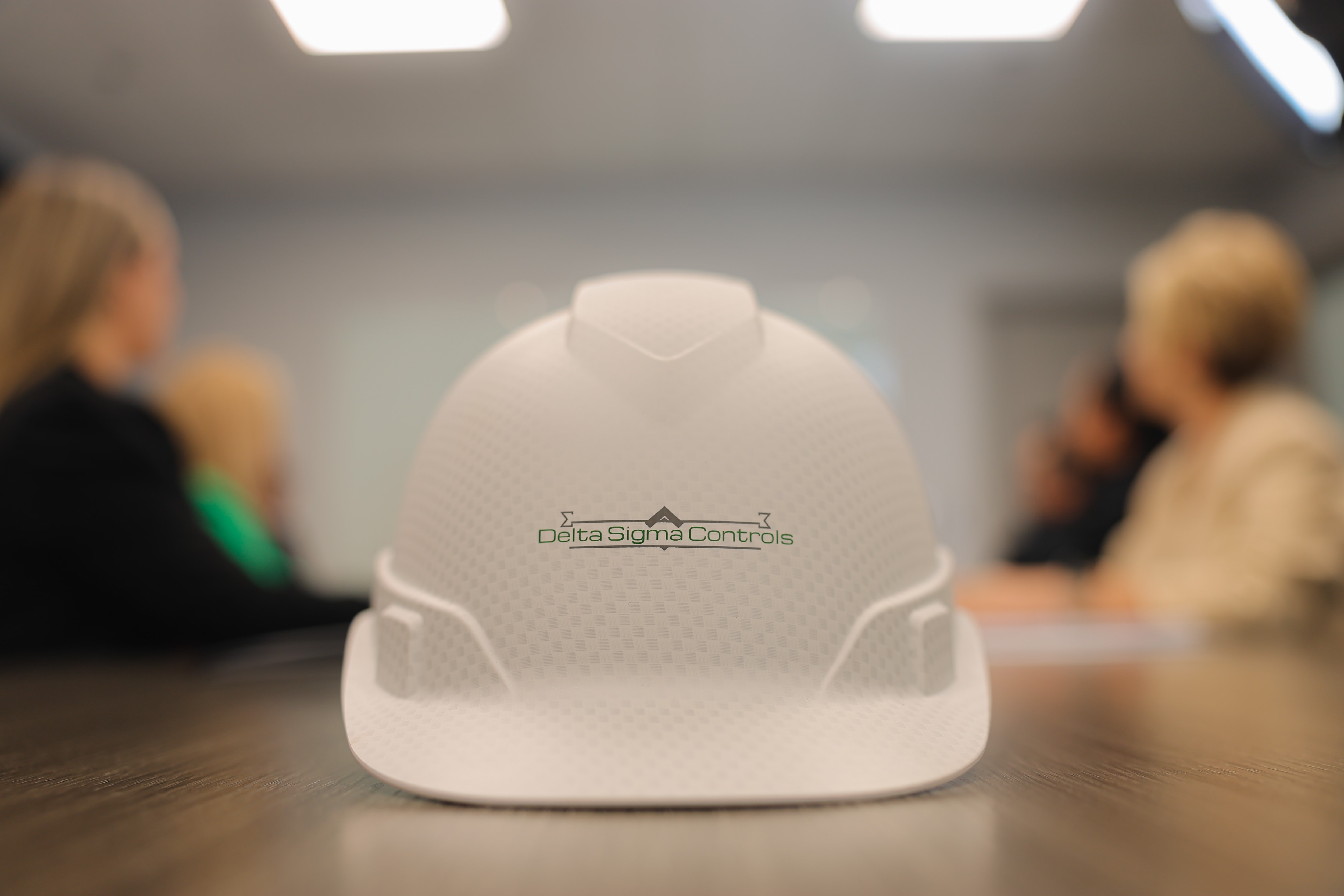 a white hard hat on a table