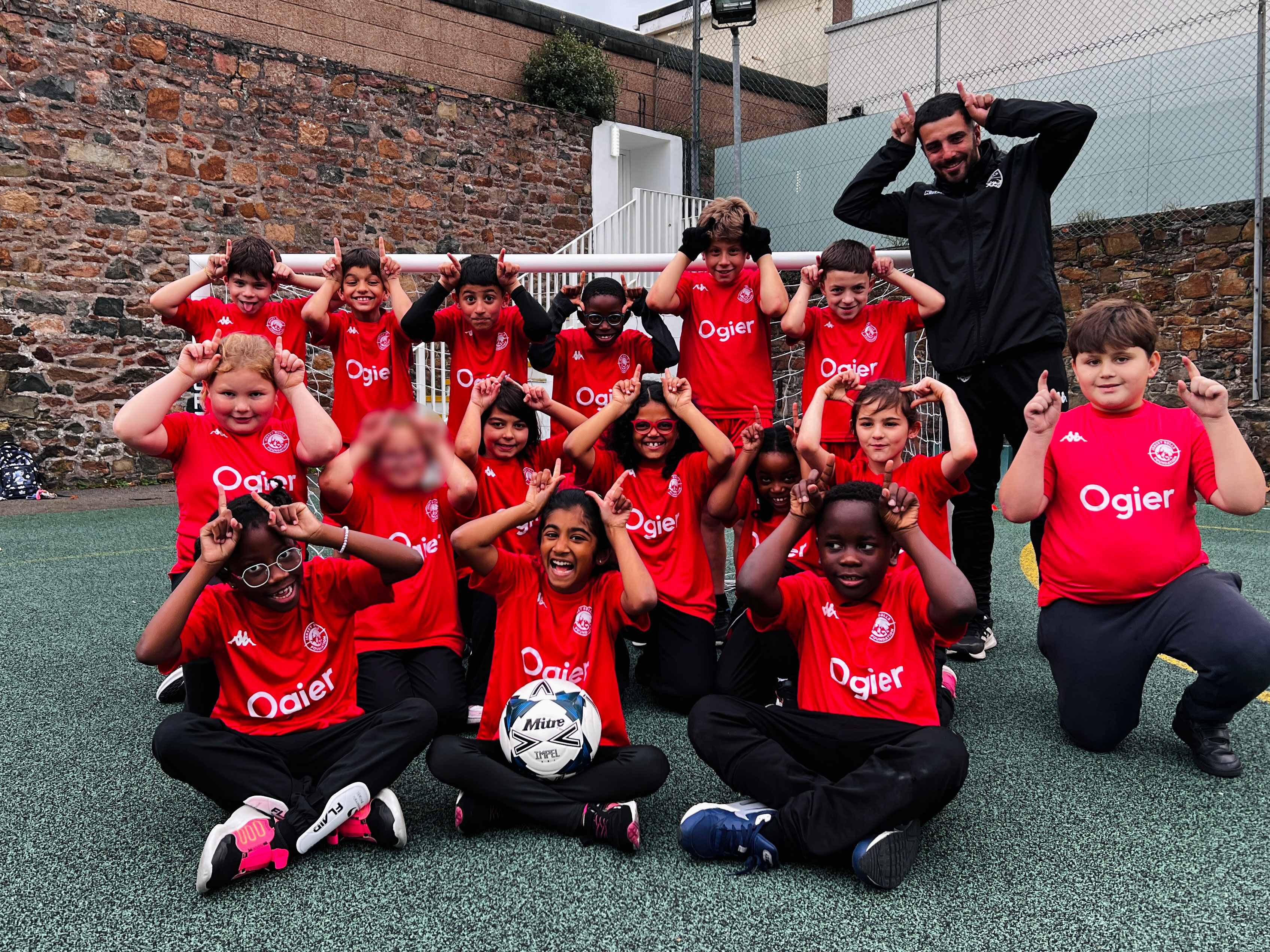 Rouge Bouillon Year 4's posing in their Jersey Bulls shirts