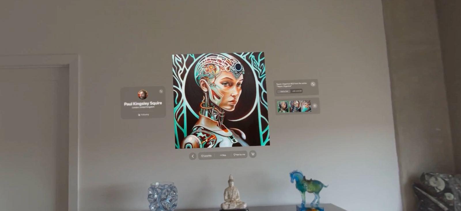 A portrait painting hung on a real living-room wall with a small details panel beside it and 2 small sculptures on the floor.