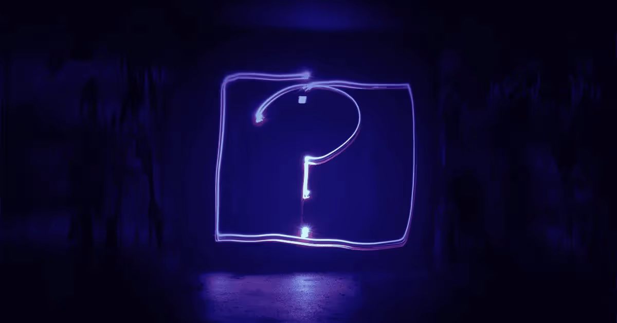 A question mark in a box on a blue-black background