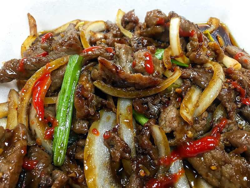 A simple stir fry with thin slices of beef simmered in a sauce of soy, brown sugar, garlic, and ginger.