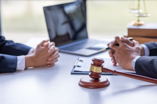 desk with laptop on it