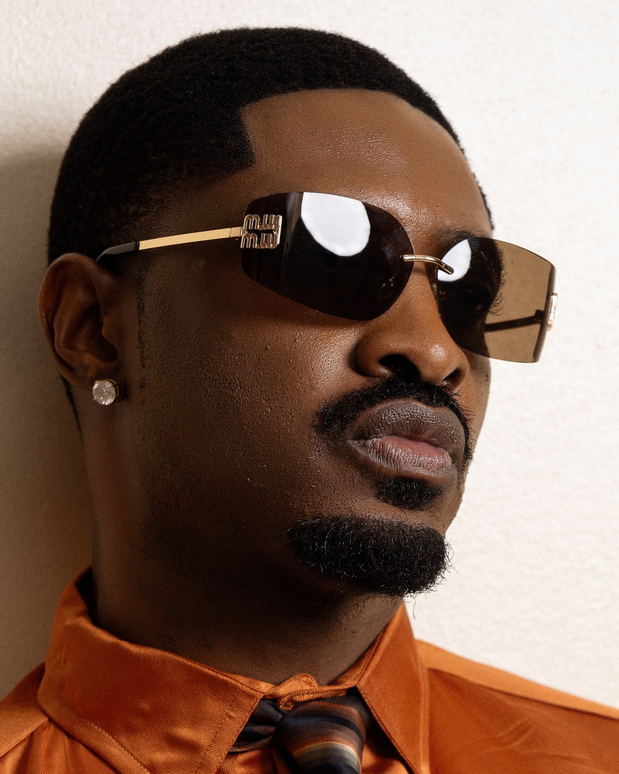 A photo of Ric Hassani on a plain background