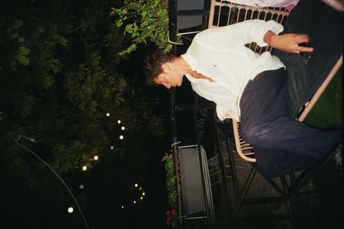 andrea polastri working on his Macbook Pro with Camacho sticker on it