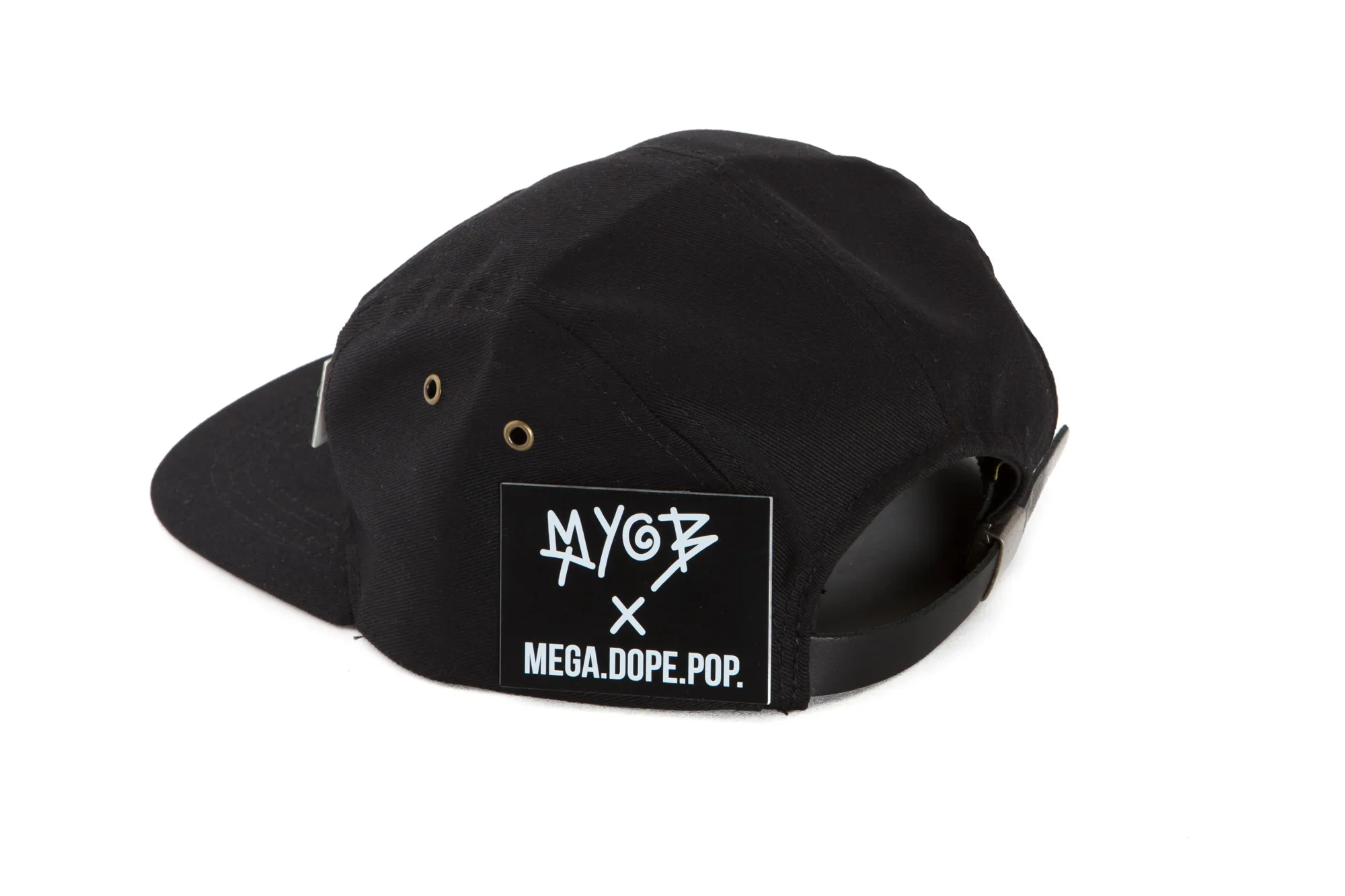 Black adjustable cap with a patch reading 'MYOB x MEGA.DOPE.POP.' on the side.