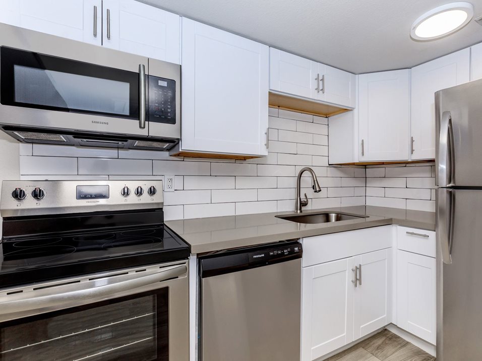 Apartment kitchen — representative home at Lumina on 19th.