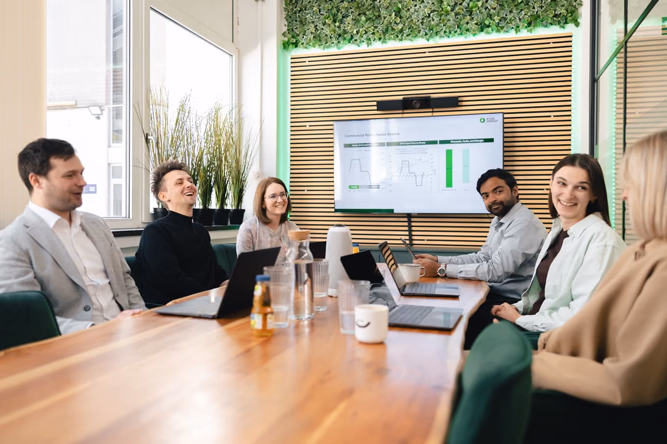 Kyon Energy employees collaborating in the office