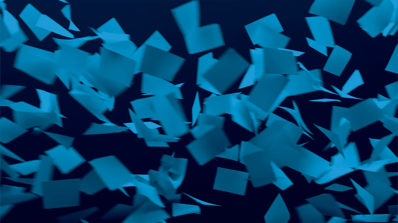 Image of hundreds of pieces of paper flying all over the place