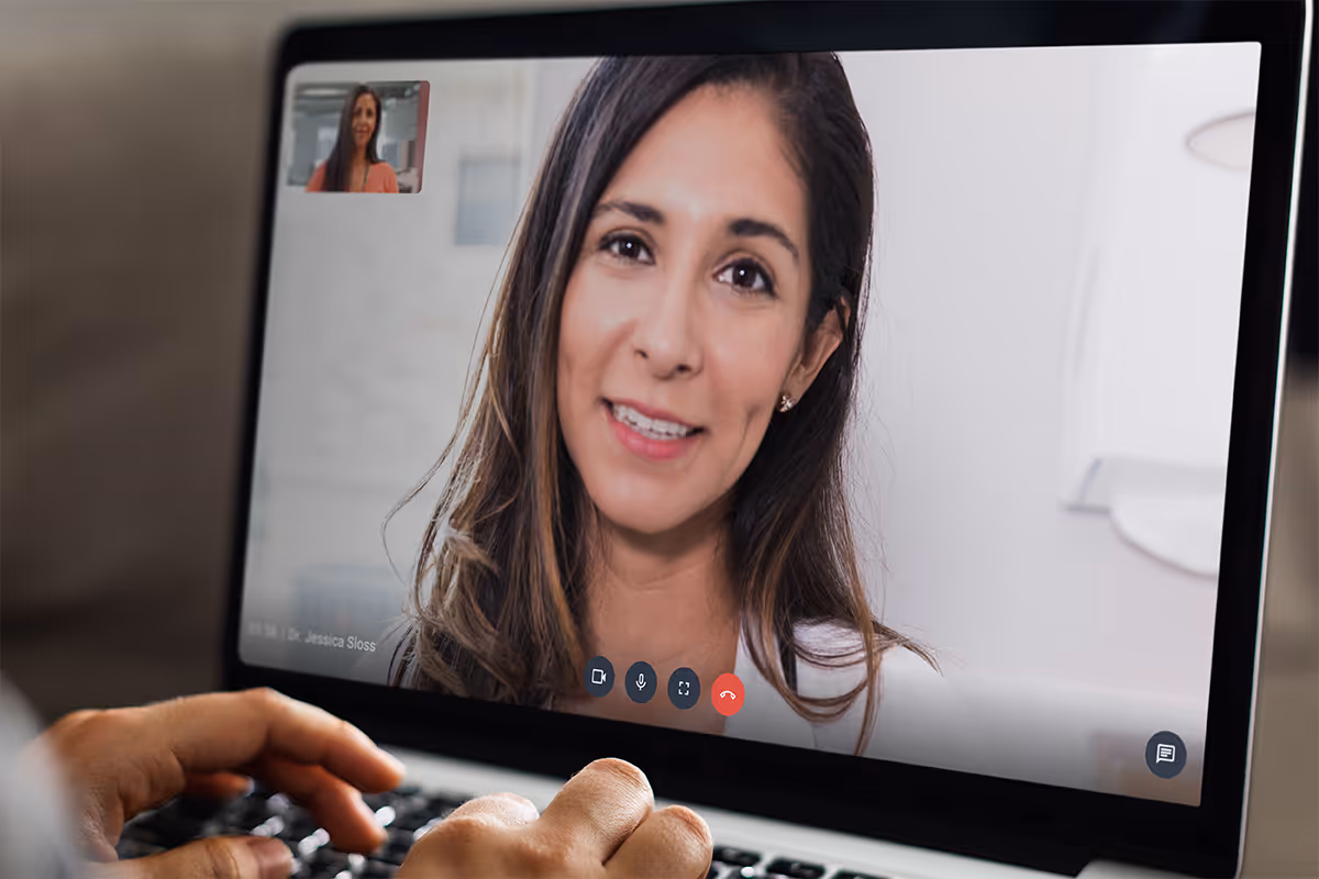 Photo of a telemedicine doctor on a laptop