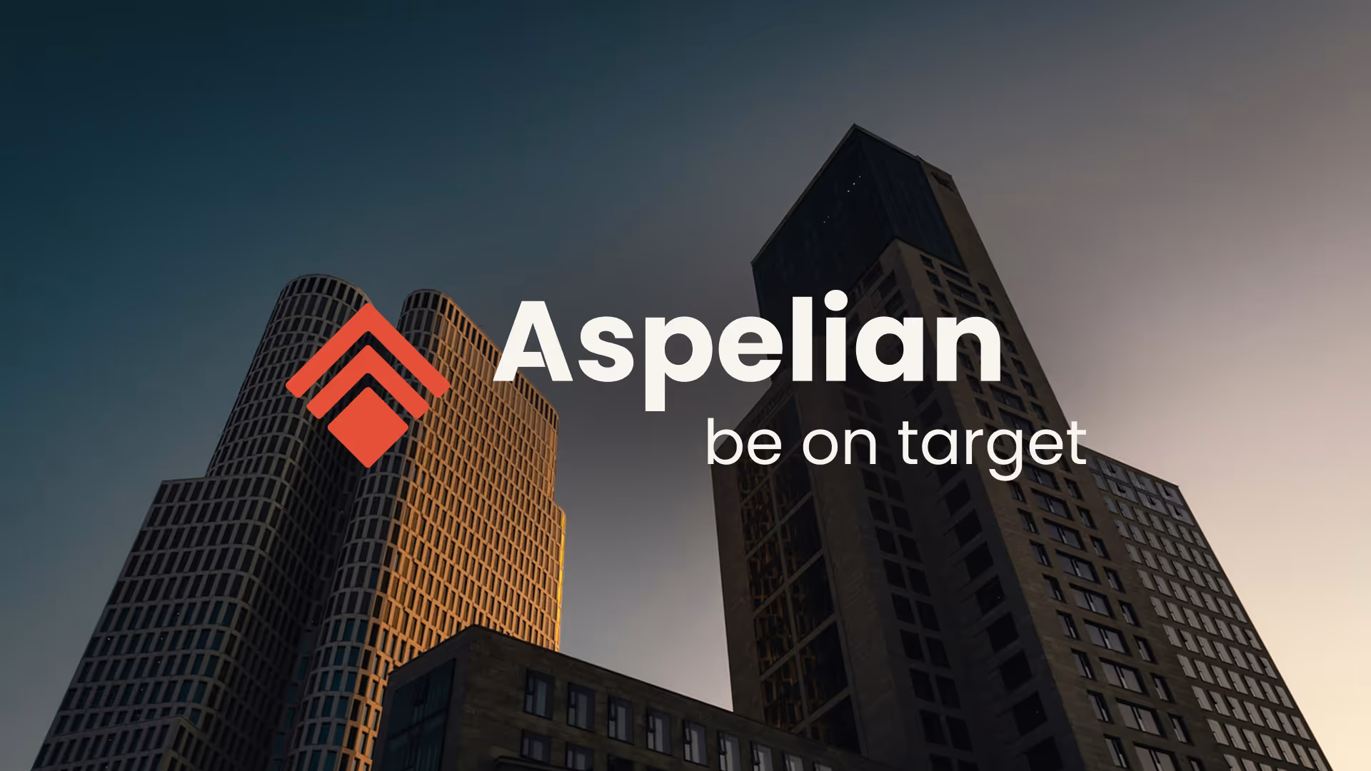 View of modern high-rise buildings at dusk with the Aspelian logo and slogan 'be on target' overlayed.