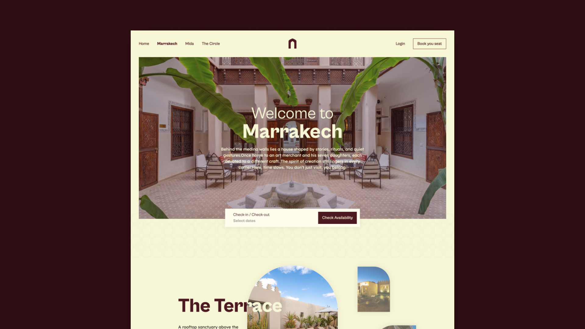 Website page showing a welcoming message for Marrakech with an image of a traditional courtyard featuring large green leaves, carved wooden doors, and metal chairs around a central fountain, along with a check-in/check-out booking form and navigation menu at the top.