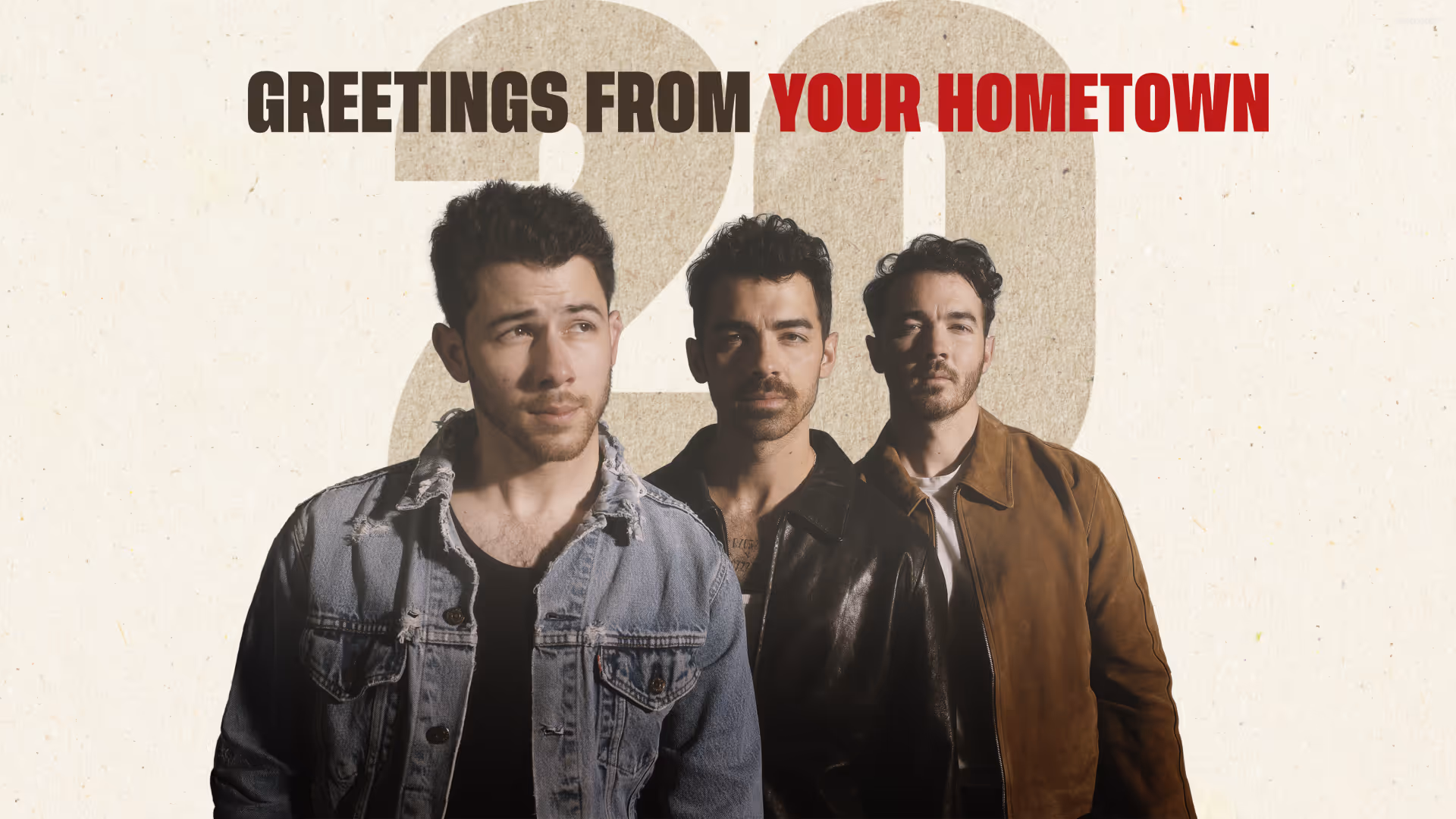 Jonas Brothers promotional asset reads "Greetings from your Hometown 20" with a photo of the Jonas Brothers.