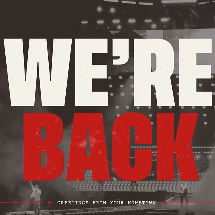 Text reads "We're back" and "Greetings from your hometown" displayed over a photo of The Jonas Brothers performing onstage.