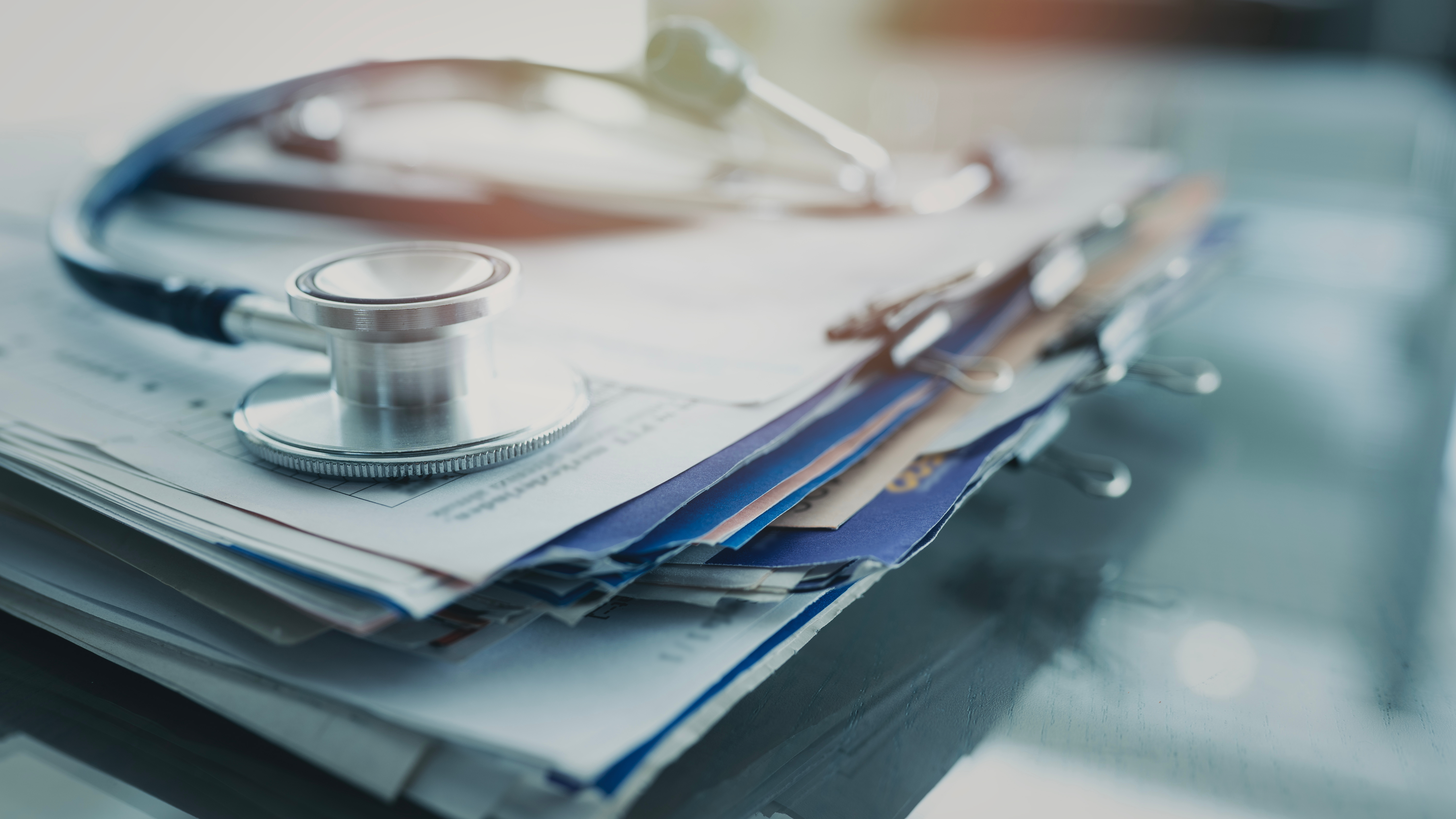 stethoscope with medical records