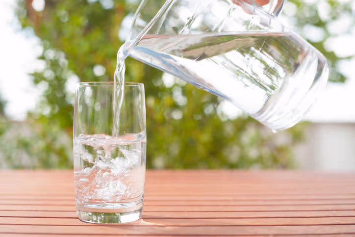 Man and woman drinking water