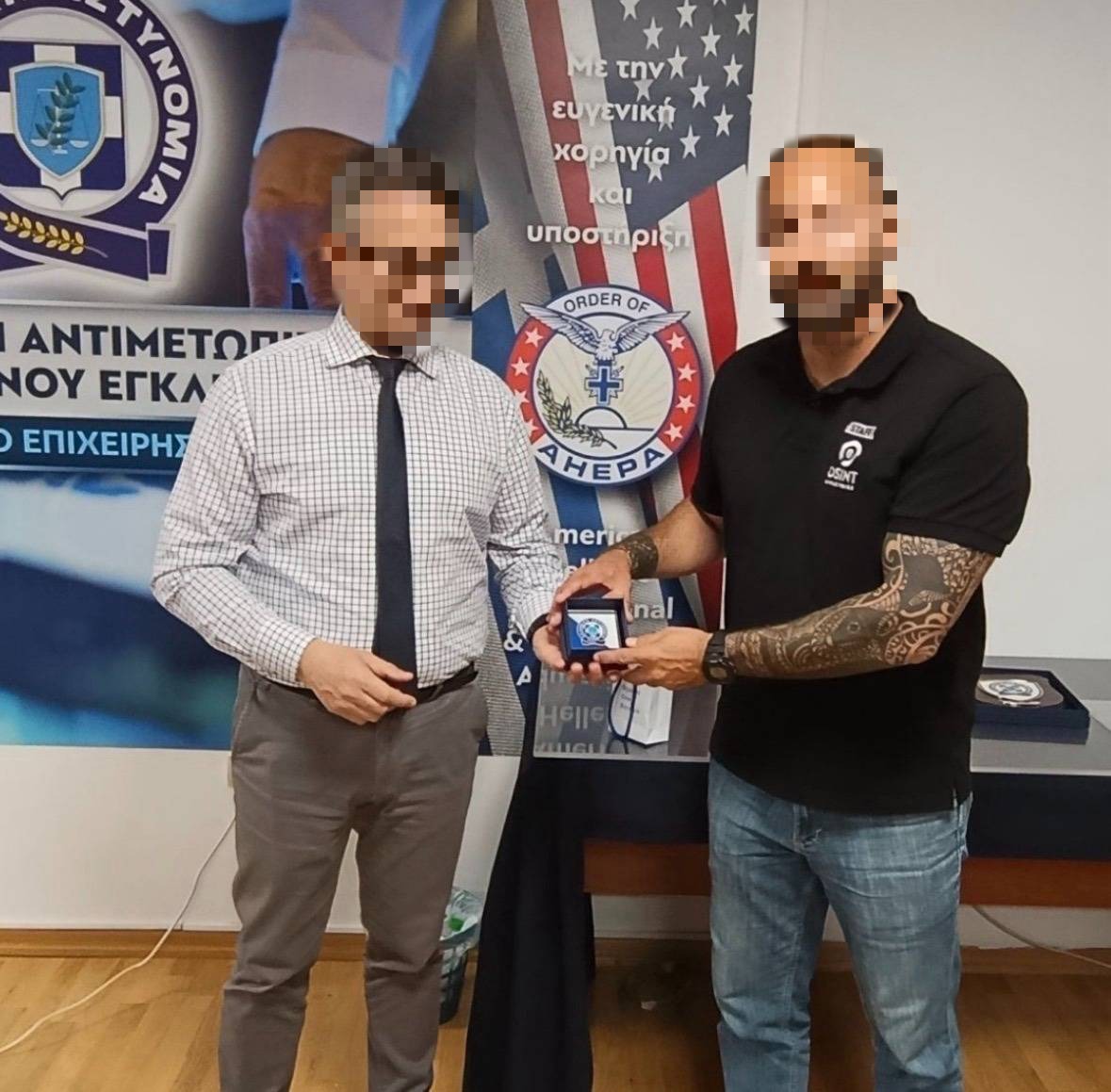 Yoni receives a commemorative plaque