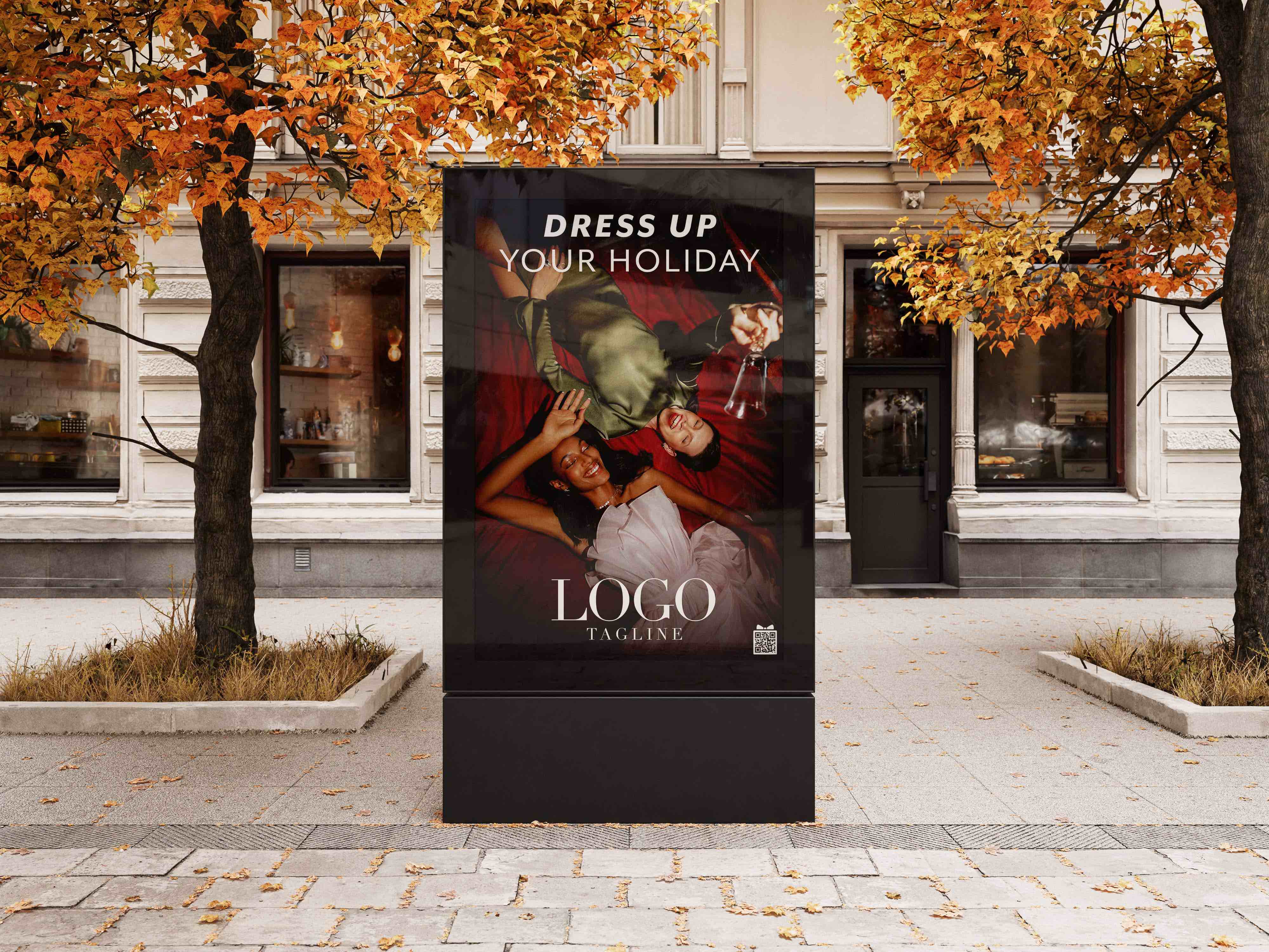 City style ad with two women laying on a red carpet smiling in holiday dresses