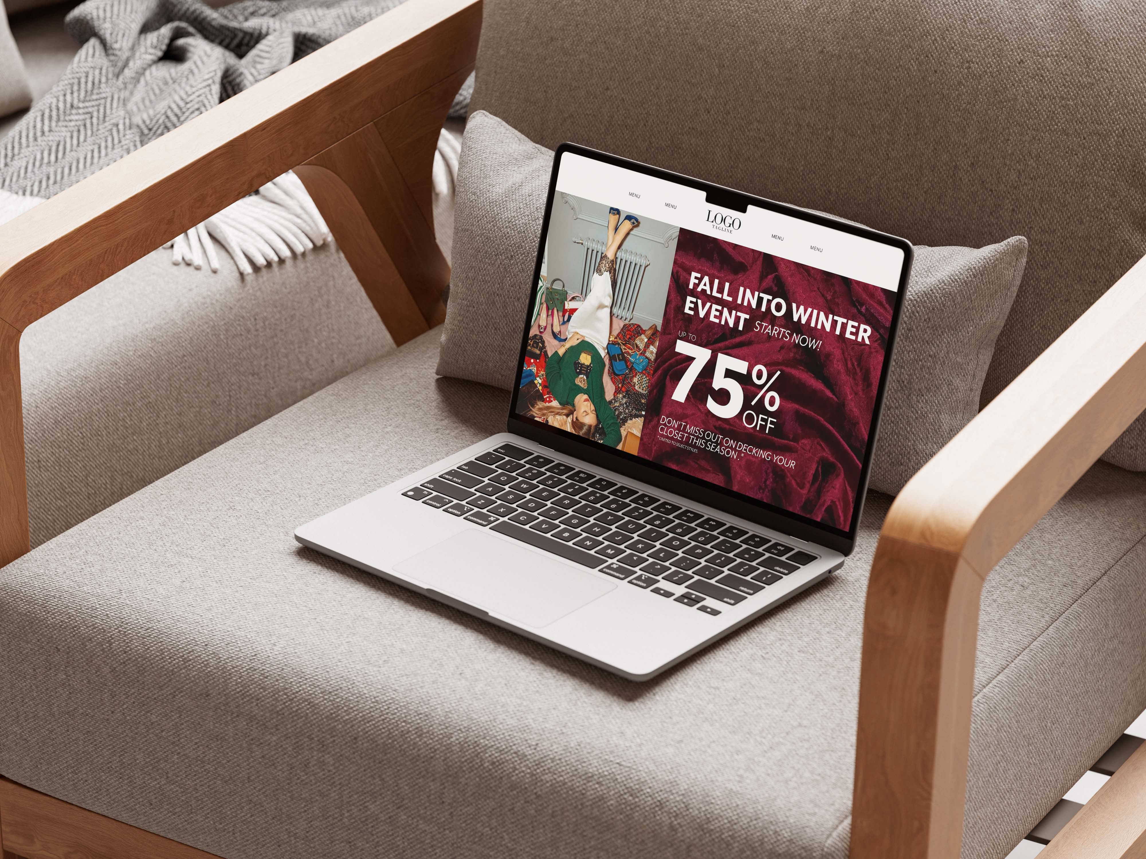 Macbook sitting on a chair open showing a landing page of the holiday sale