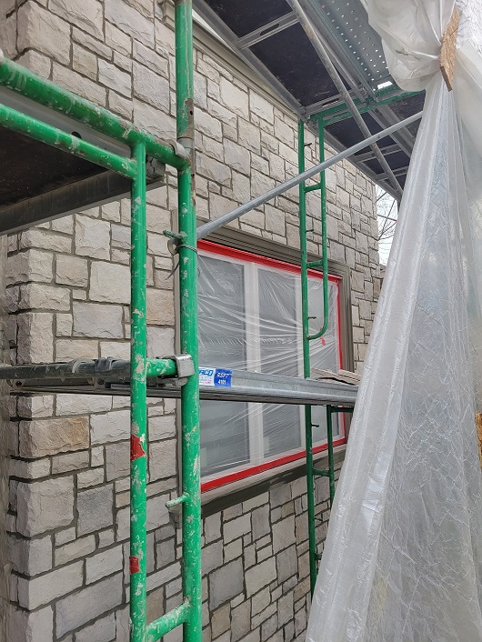 EIFS insulation installation on historic Guelph house