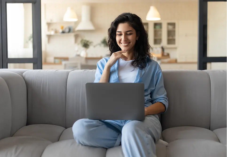 Happy patient on laptop