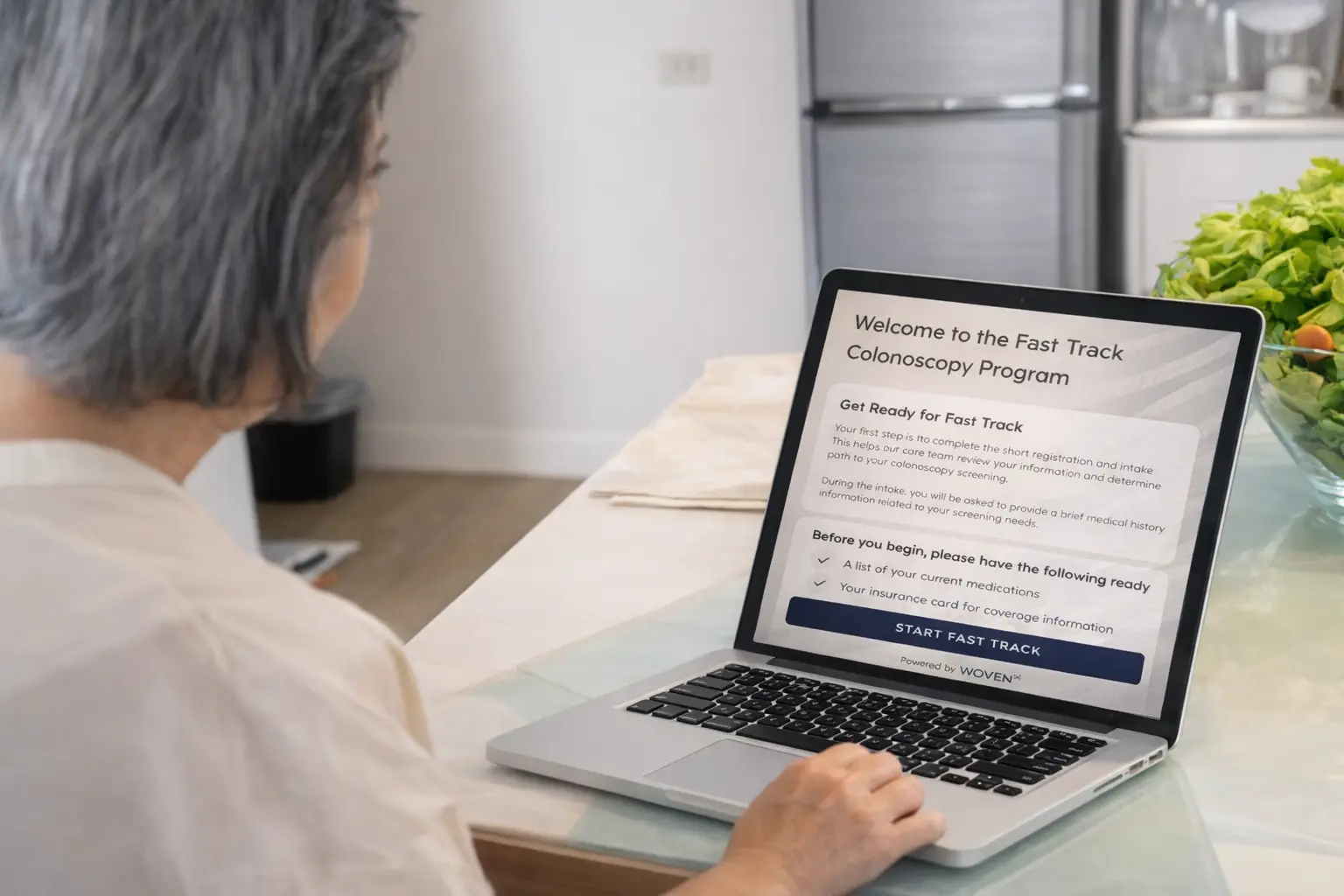 Image of senior woman accessing wovenX platform on laptop