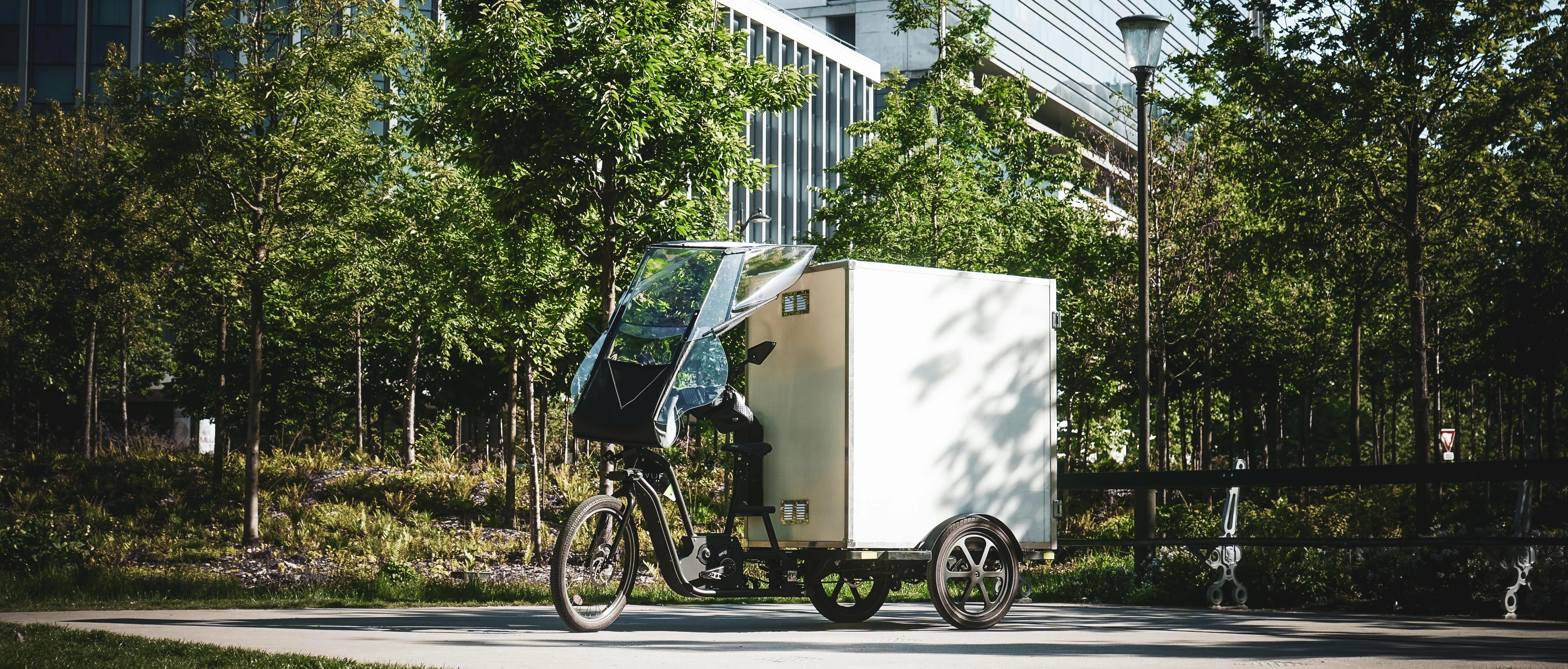 Triporteur électrique en centre-ville